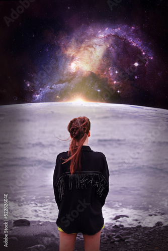 Young girl with braids observing the galaxy sea 