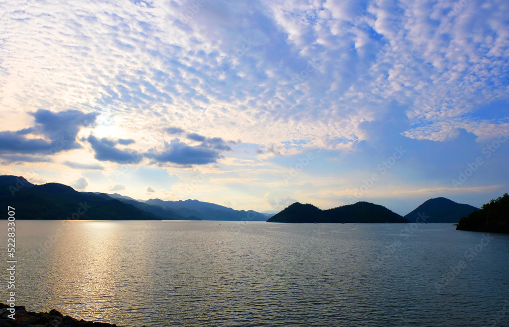 Scenery of lake and mountain before sunset and blue sky at Srinagarind dam, Kanchanaburi ,Thailand