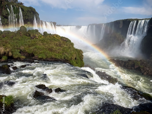 Landscape of Iguazu waterfalls with rainbow