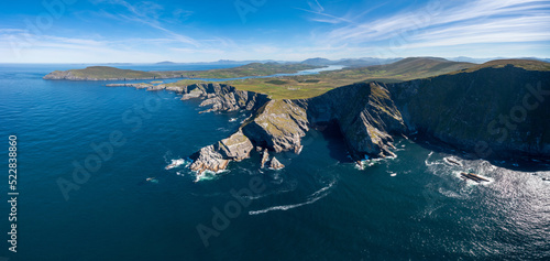 panorama landscape view of the Kerry Cliffs and Iveragh Peninsula in County Kerry of Ireland photo