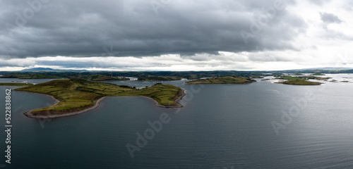 panorama landscape of Rosmoney Pier and marina and the drumlin islands of Clew Bay photo