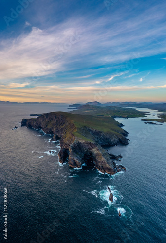 vertical panorama landscape of the Bray Head cliffs on Valentia Island at sunset photo