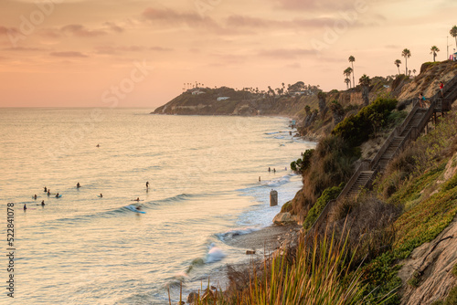Surfers enjoying the summer surf in Encinitas CA