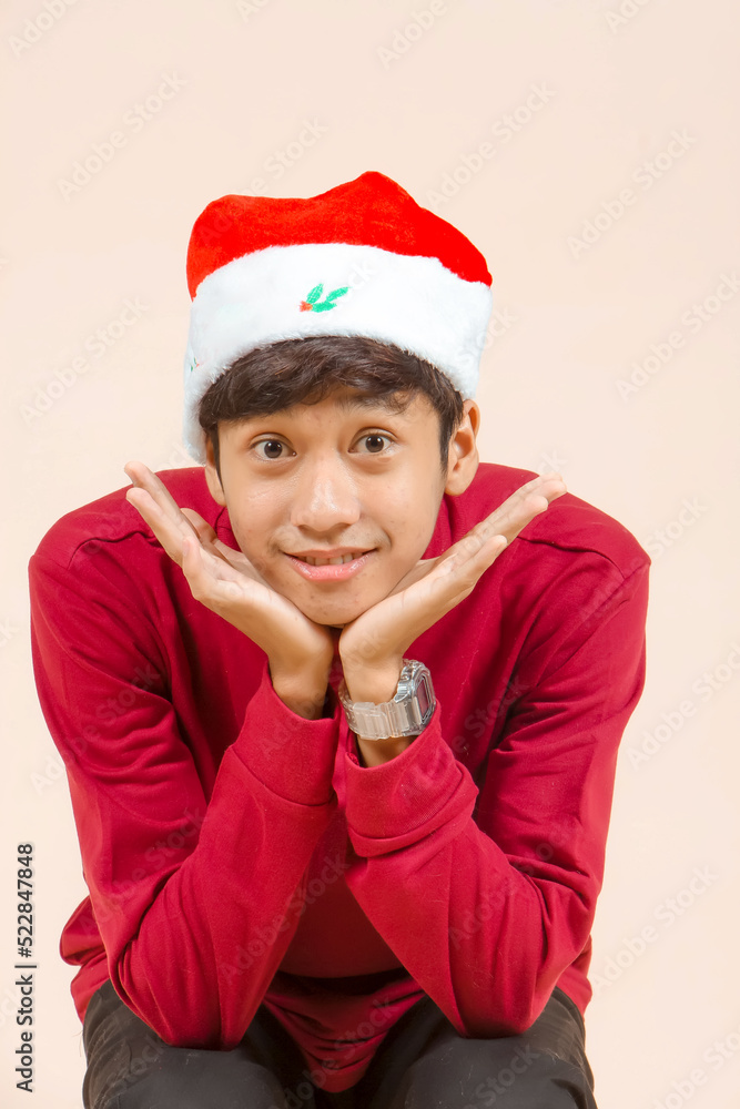 Young asian men using or celebrating christmas. Young asian men using or celebrating christmas.