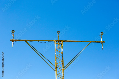 Wallpaper Mural Airport landing lights on a sunny day against a blue sky. Torontodigital.ca