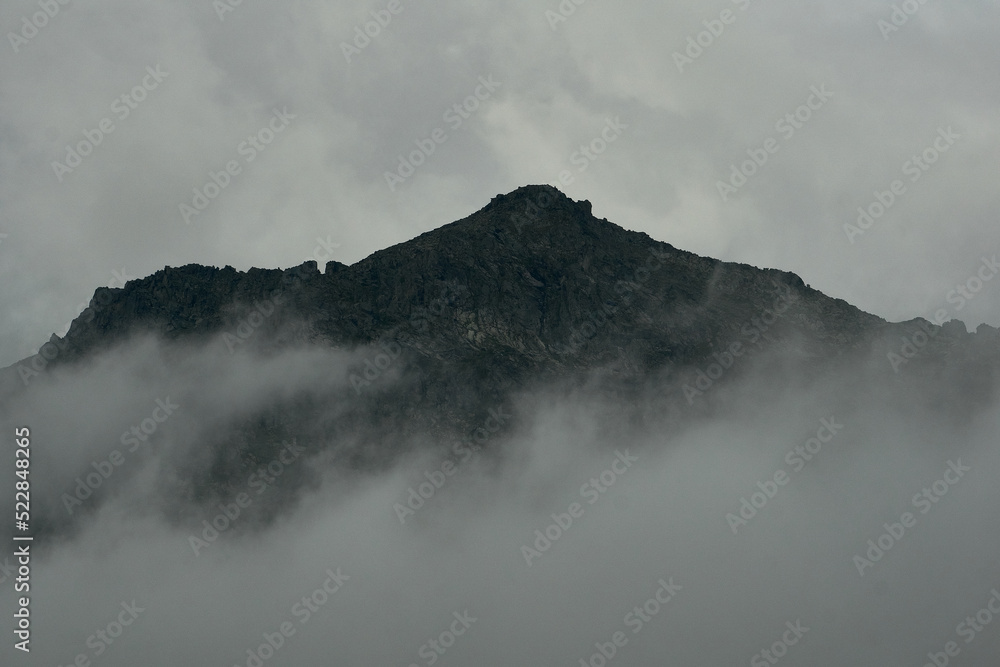 Dense fog in the mountain valley of the Katunsky Reserve Altai Dense fog in the mountain valley of the Katunsky Reserve Altai
