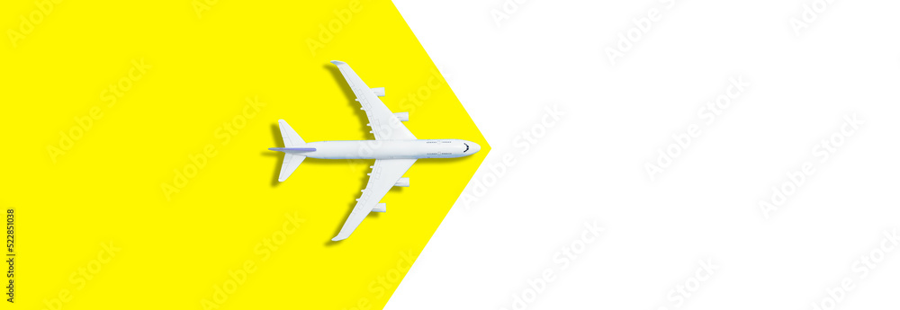 Model white plane, airplane on yellow background. Top view, flat lay. Travel, vacation concept. Model white plane, airplane on yellow background. Top view, flat lay. Travel, vacation concept.