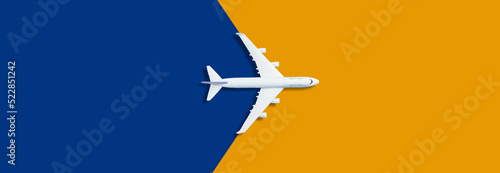 Model plane,airplane on pastel color background orange blue