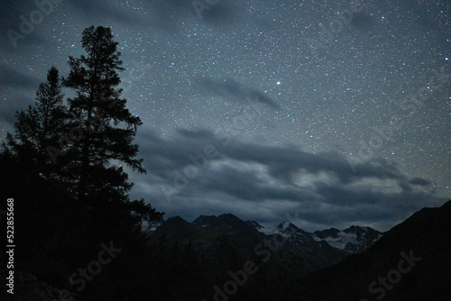 Night sky over the mountains of the Katunsky reserve in Altai