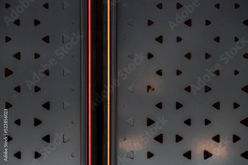 Dark gray perforated metal ...