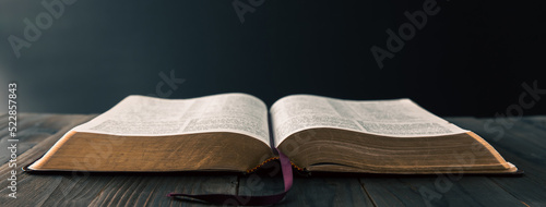 Fotografía Open Holy Bible on table.