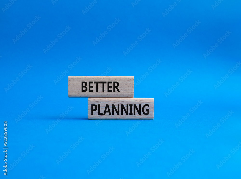Better planning symbol. Concept word Better planning on wooden blocks. Beautiful blue background. Business and Better planning concept. Copy space Better planning symbol. Concept word Better planning on wooden blocks. Beautiful blue background. Business and Better planning concept. Copy space