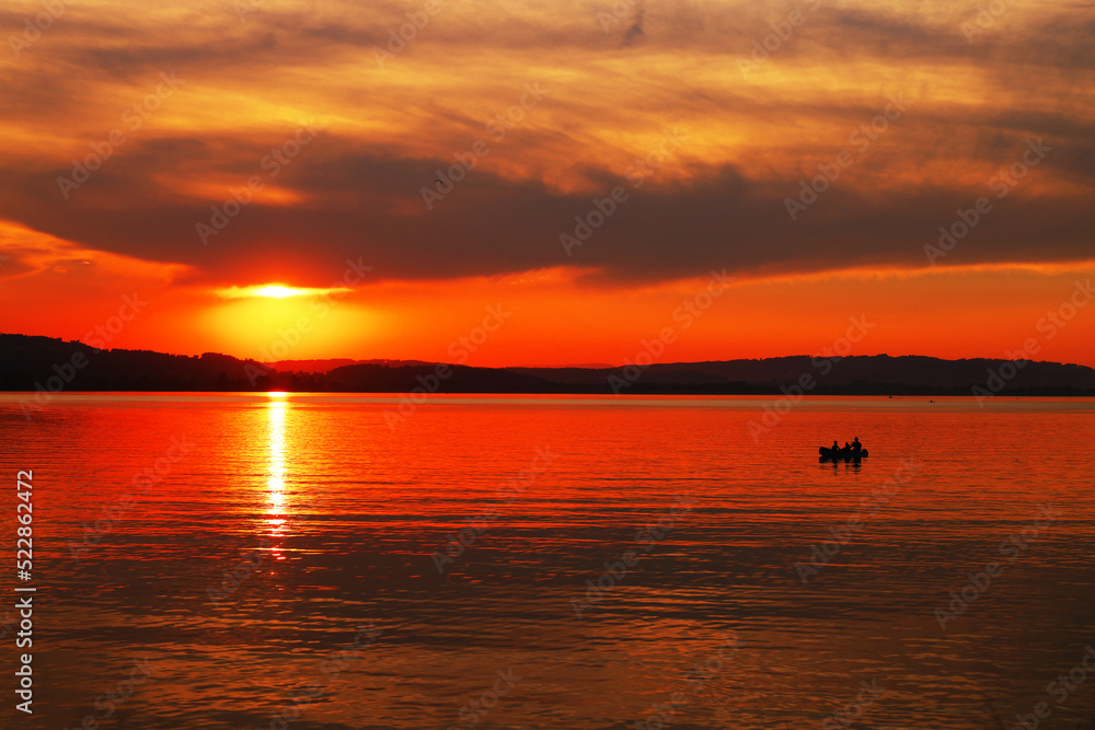 Sunset light over Sempach lake in Switzerland, Europe Sunset light over Sempach lake in Switzerland, Europe