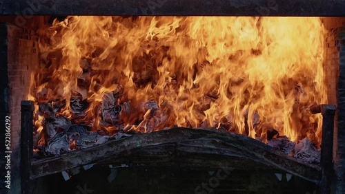 Burning paper in an oven video 4K