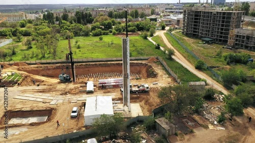 Wallpaper Mural 4K. Bird's-eye view of the installation of pipes in residential buildings Torontodigital.ca