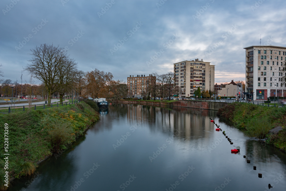 canal and houses in the fall