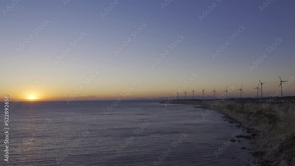 Seascape and wind turbines.
View of the sunset and wind turbines.
Seascape and wind turbines.
View of the sunset and wind turbines.