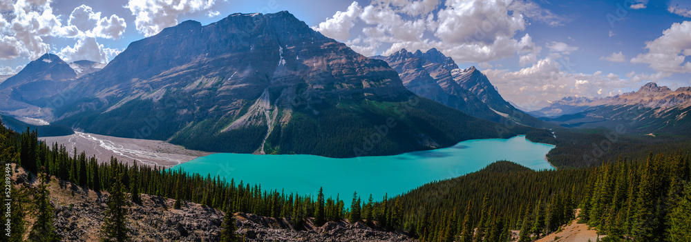 Peyto Lake and Mistaya Mountain seen from the Upper Panorama Overlook in Banff National  Park. The turquoise blue glacier-fed lake on the Icefields Parkway in Alberta, Canada.