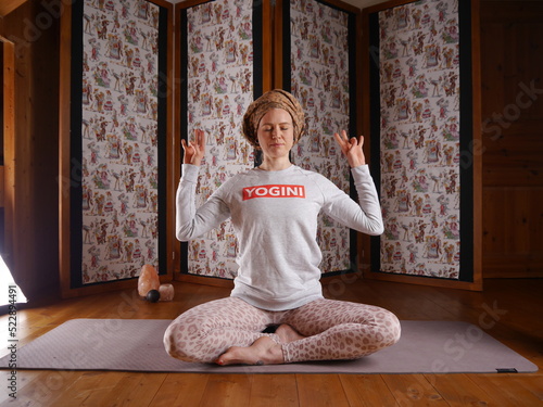 Blonde woman in different Yoga and Pilates poses at home, By Yuri Ugarte Cespedes. photo