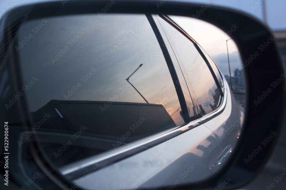 A side view of the car reflected in the car's side mirror
A side view of the car reflected in the car's side mirror