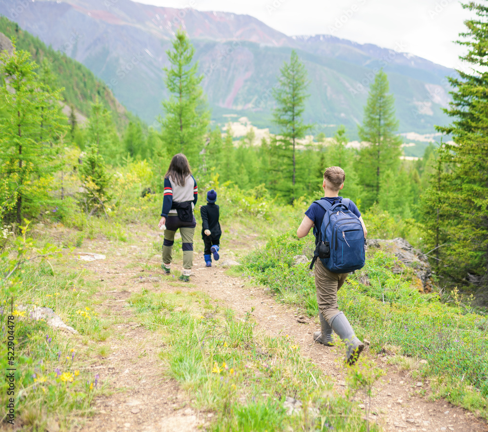 Boy hiking in the mountains 