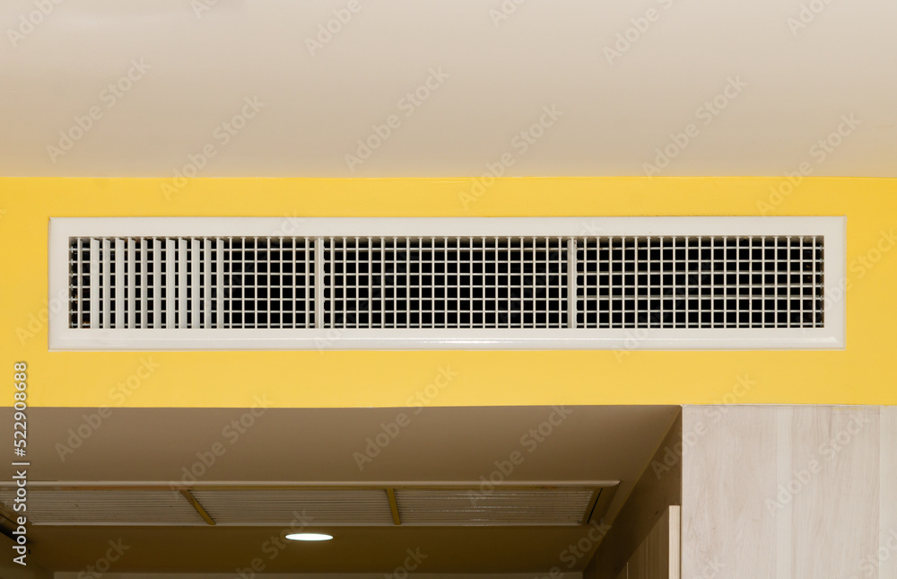 Air conditioning wall mounted ventilation system on ceiling in the white  hotel room, Air conditioning grille or hole or air drainage. Photos | Adobe  Stock