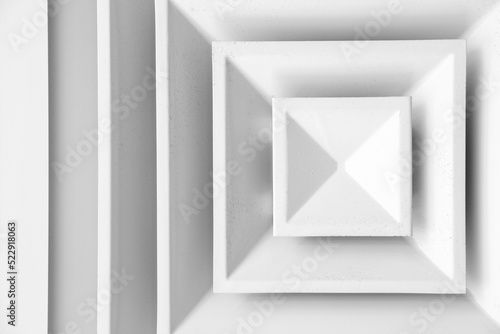 Fototapeta Naklejka Na Ścianę i Meble -  White ceiling ventilation grille with dust on diffusors