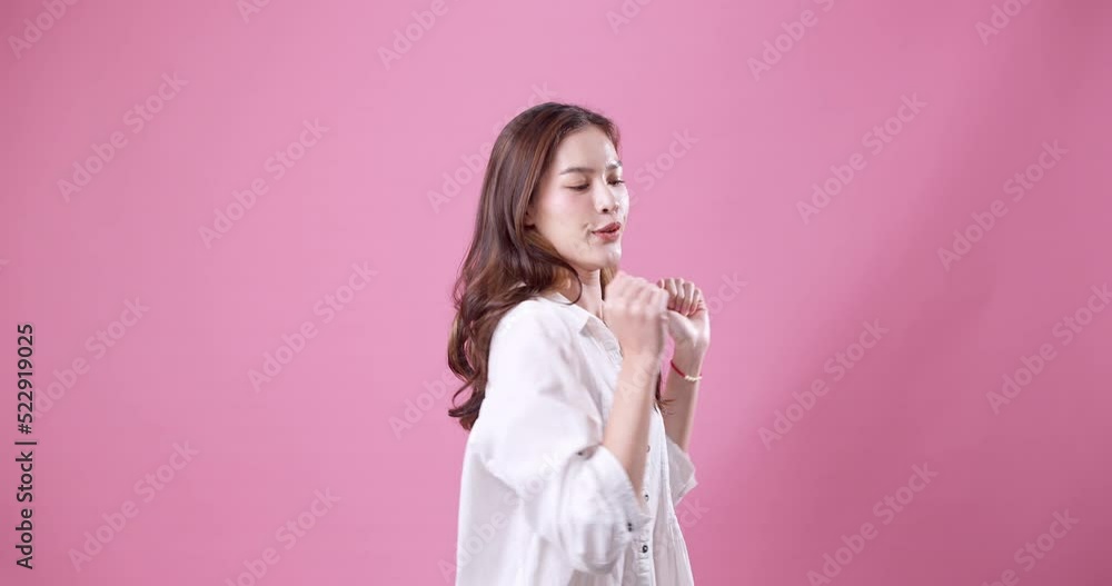 Beautiful young woman having fun in the studio and looking at the camera. Beautiful young woman having fun in the studio and looking at the camera.