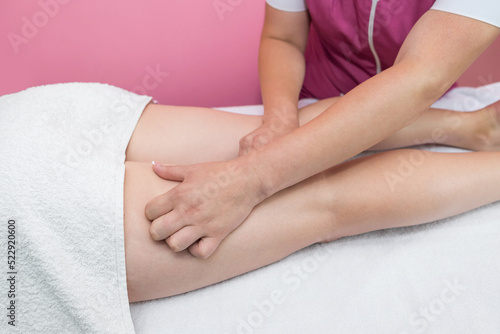 Massage of the legs and buttocks to reduce cellulite and maintain a healthy look