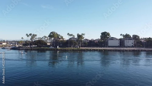 Wallpaper Mural Drone fly a long waterway with boats moving, aerial view. Torontodigital.ca