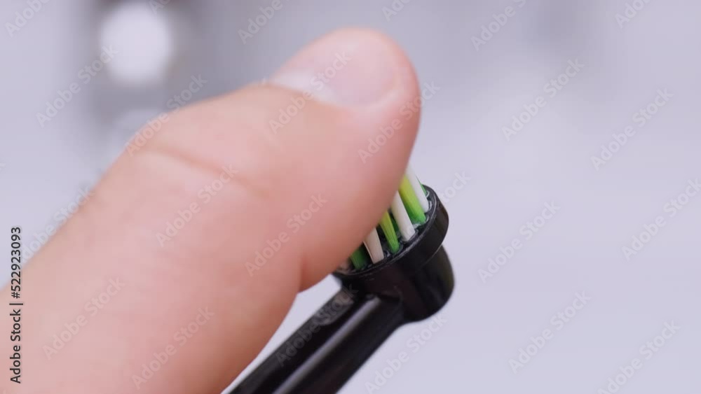 Worn out bristles of electric toothbrush. View of old ultrasonic tooth ...