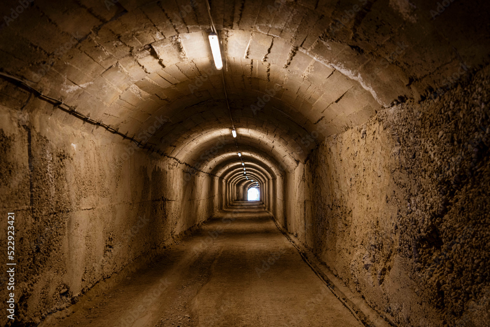 Obraz na płótnie Albania, May 12, 2022 - Tunnel leading to a WWII bunker. BunkArt w salonie