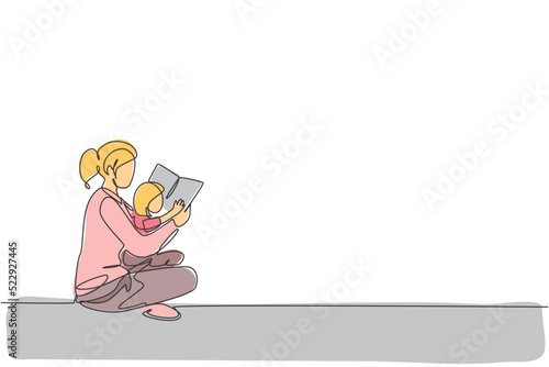 Single continuous line drawing of young mother sitting on floor and reading story book to her daughter at home. Happy family parenting concept. Trendy one line draw design graphic vector illustration