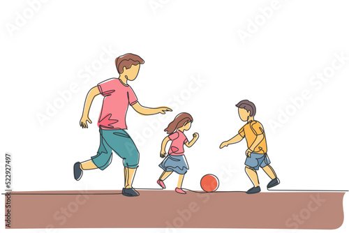 One single line drawing of young father run and play football soccer with his son and daughter at public park vector illustration. Happy family parenting concept. Modern continuous line draw design