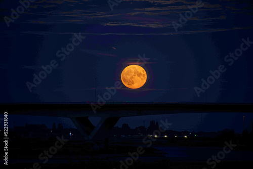 full moon over the city