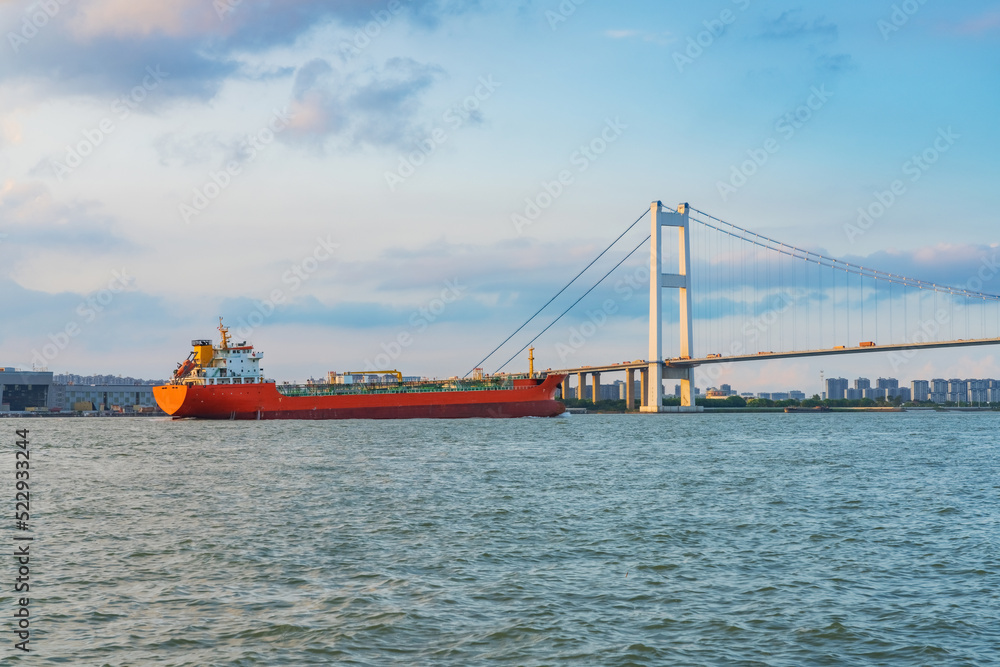 Jiangyin Yangtze River Bridge and cargo ships and Yangtze River scenery in Jiangyin, China