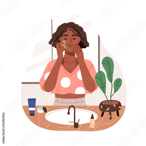 Black woman massaging face with guasha jade scraper in bathroom. Girls beauty routing for skin care. Home skincare procedure, treatment. Flat vector illustration isolated on white background