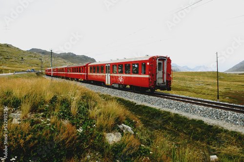 Swiss mountain train Bernina Express crossed Alps. St.Moritz, Switzerland