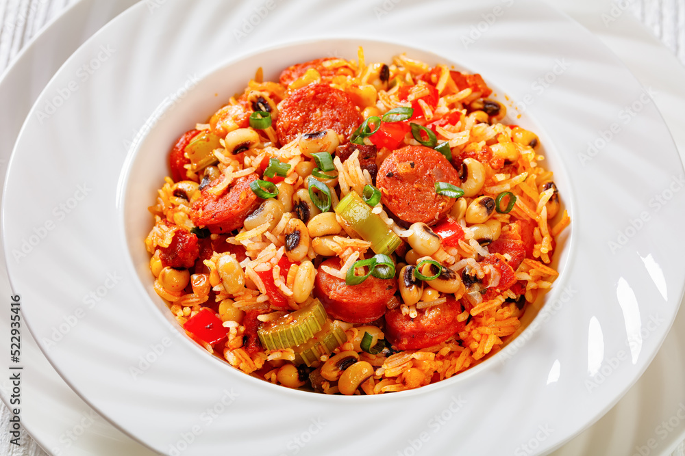 Hoppin John with rice in white bowl, top view Hoppin John with rice in white bowl, top view