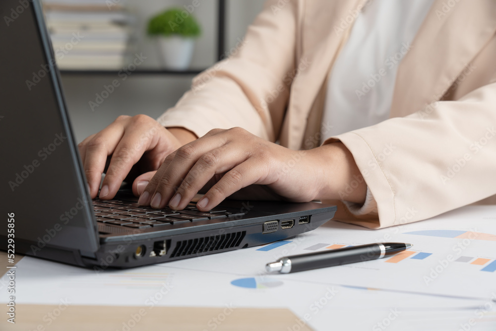 Business woman working for budget or report graph document paper on desk Business woman working for budget or report graph document paper on desk