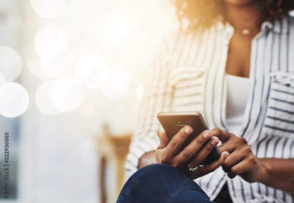 Closeup of woman hands holding, typing and using a phone to browse the internet. Young casual female on smartphone texting, messaging and chatting with friends on social networks. Closeup of woman hands holding, typing and using a phone to browse the internet. Young casual female on smartphone texting, messaging and chatting with friends on social networks.