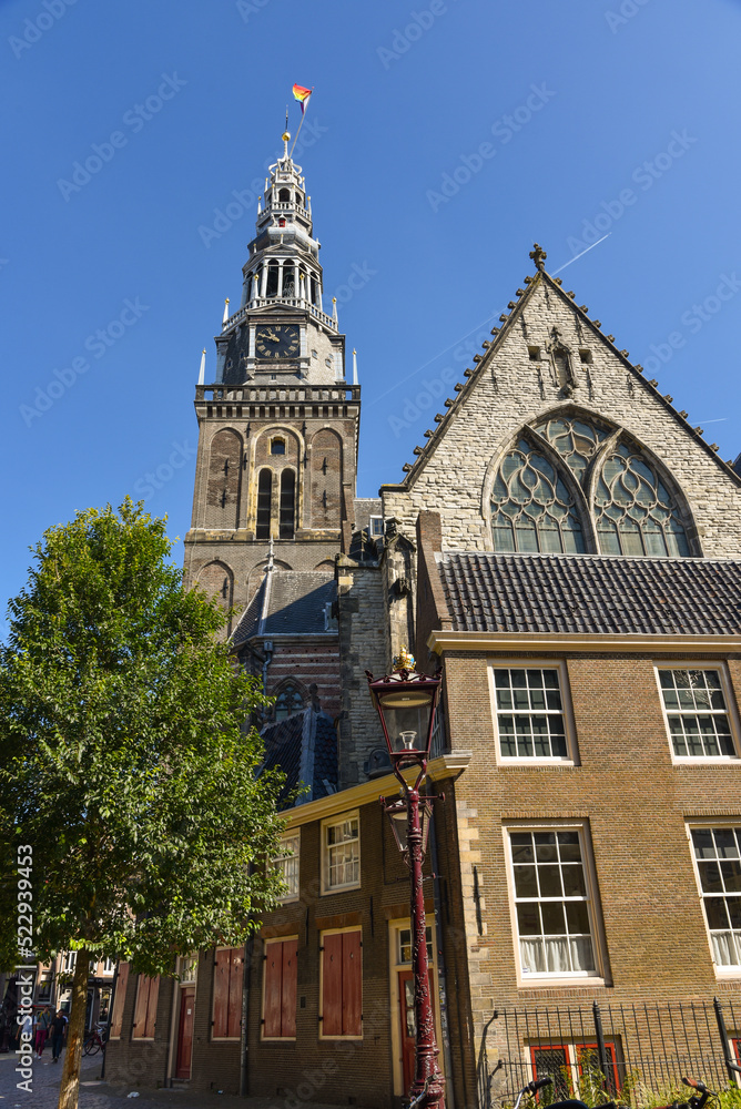 Amsterdam, Netherlands. August 2022. The old church at the red light district in Amsterdam.