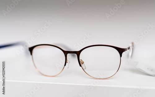 Corrective eyeglasses close up view. Optical plastic eyewear classic glasses.