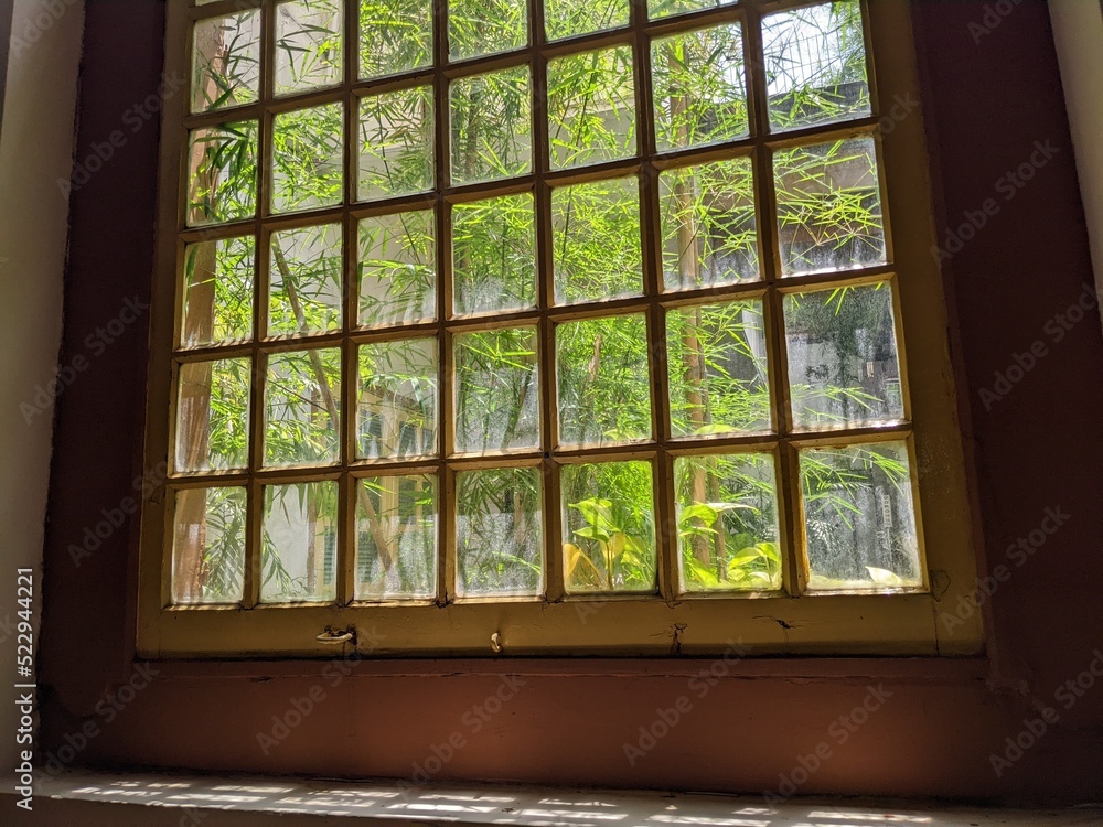 Photo texture wooden window with retro vibes interior on the traditional restaurant. The photo is perfect for menu background, Interior advertising and brochure. Photo texture wooden window with retro vibes interior on the traditional restaurant. The photo is perfect for menu background, Interior advertising and brochure.