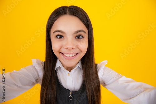 Amazed teenager making selfie. Tenn girl in casual look. photo