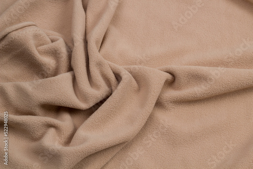 Fleece fabric blue top view. Texture of textile fleece bedspread. 