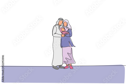 One continuous line drawing of young Islamic dad and mom standing and hugging their sleepy baby. Arabian Muslim happy family parenting concept. Dynamic single line draw design vector illustration