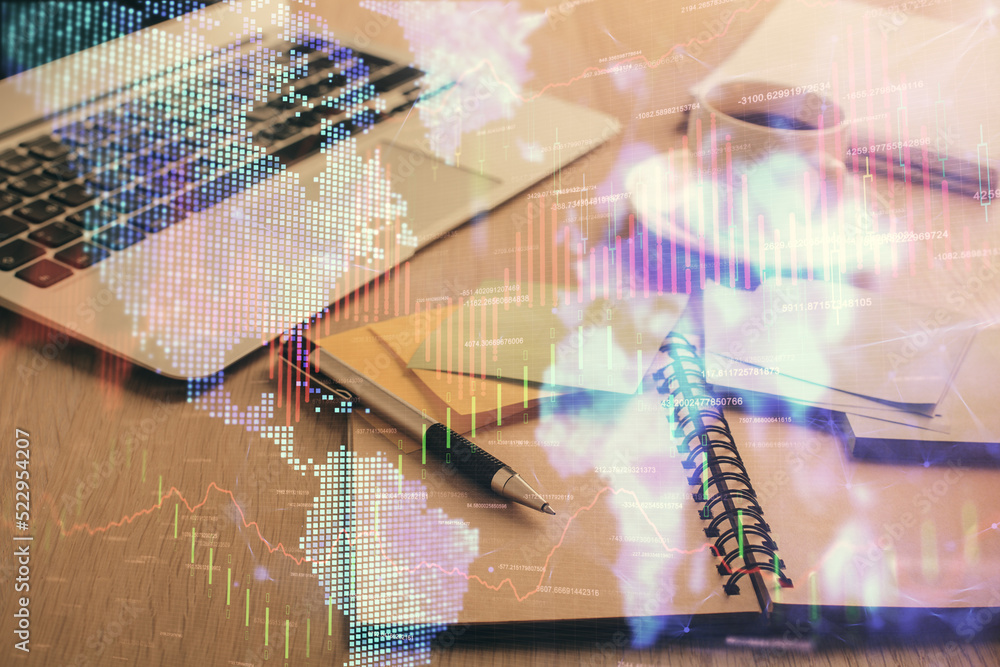 Multi exposure of forex graph drawing and desktop with coffee and items on table background. Concept of financial market trading