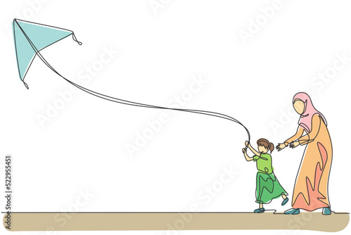 One single line drawing of young Arabian mom and daughter playing and flying kite at public park vector illustration. Happy Islamic muslim family parenting concept. Modern continuous line draw design