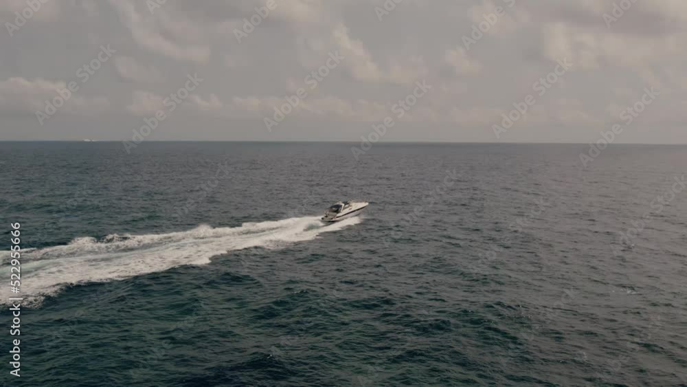 boat cuts through the sea boat cuts through the sea